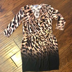 Pretty dress, stretchy but runs a bit small